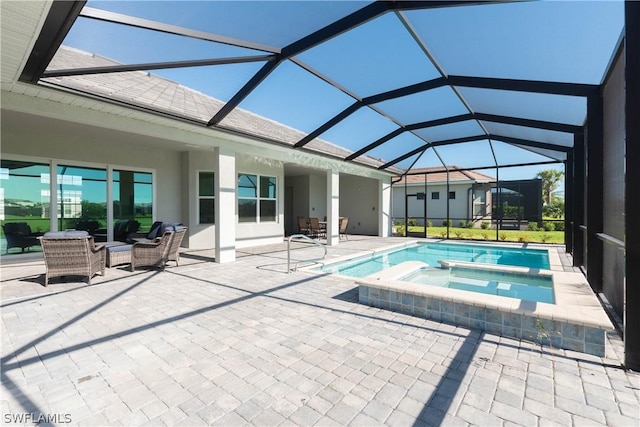 view of swimming pool with a lanai, outdoor lounge area, a patio, and an in ground hot tub