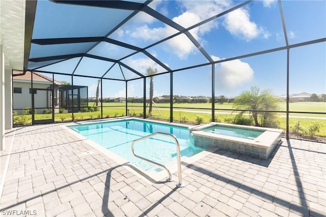 view of swimming pool with a lanai, a patio area, and an in ground hot tub