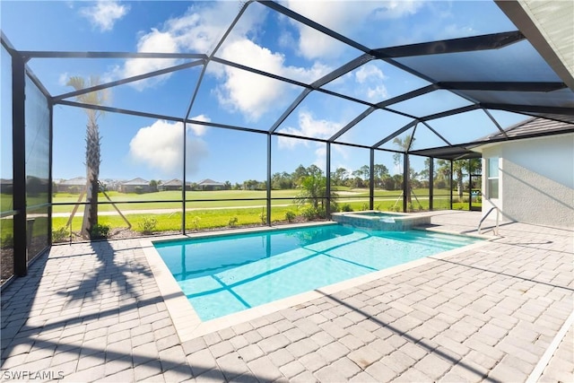 view of pool featuring a lanai, a patio area, and an in ground hot tub