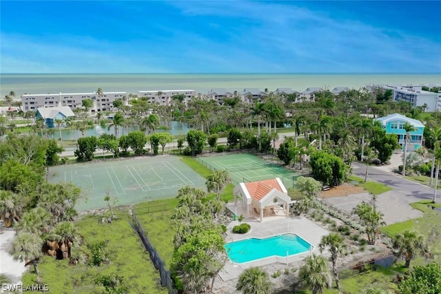 birds eye view of property featuring a water view