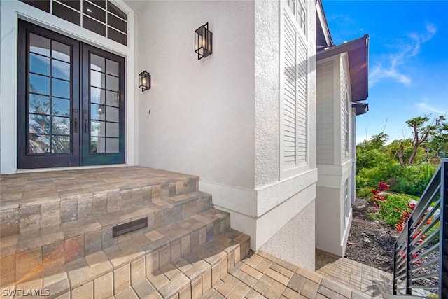 doorway to property featuring french doors