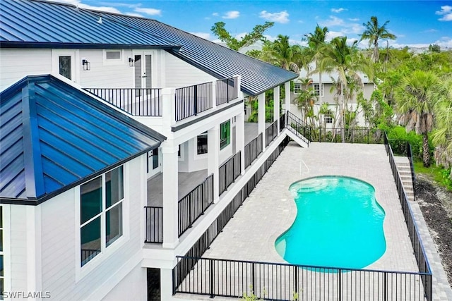 view of pool with a patio area