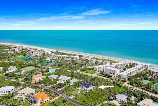 aerial view featuring a beach view and a water view