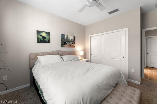 bedroom with carpet flooring, a closet, and ceiling fan