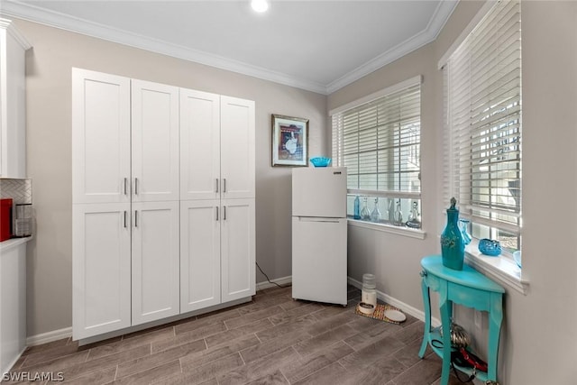 miscellaneous room featuring crown molding