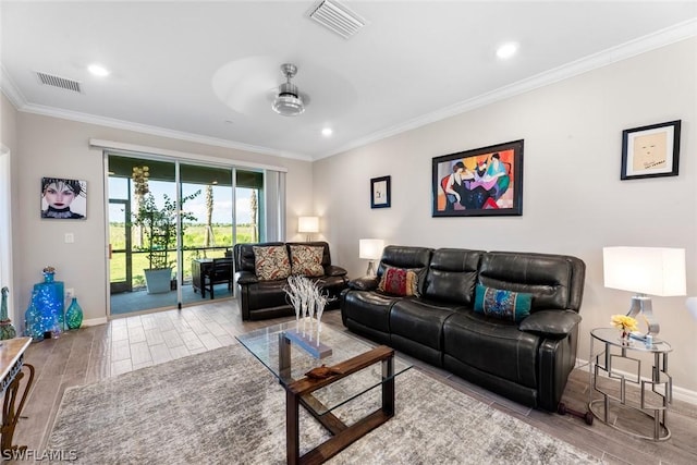 living room featuring ceiling fan and crown molding