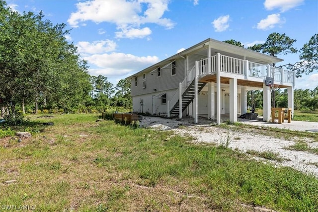 view of side of property featuring a deck