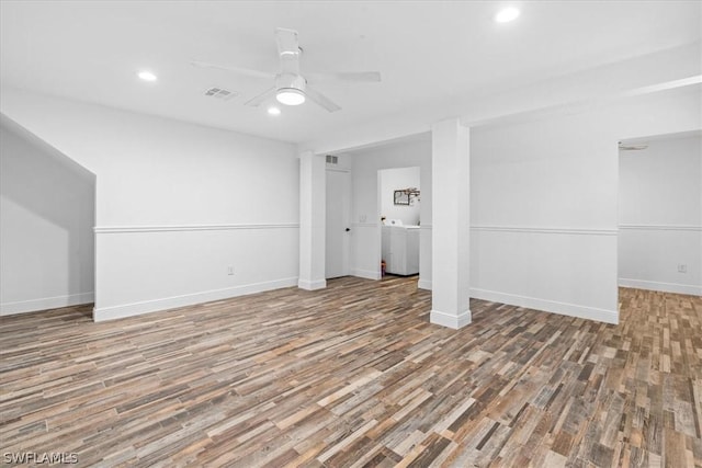 interior space featuring wood-type flooring and ceiling fan