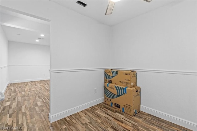 unfurnished room with ceiling fan and hardwood / wood-style floors