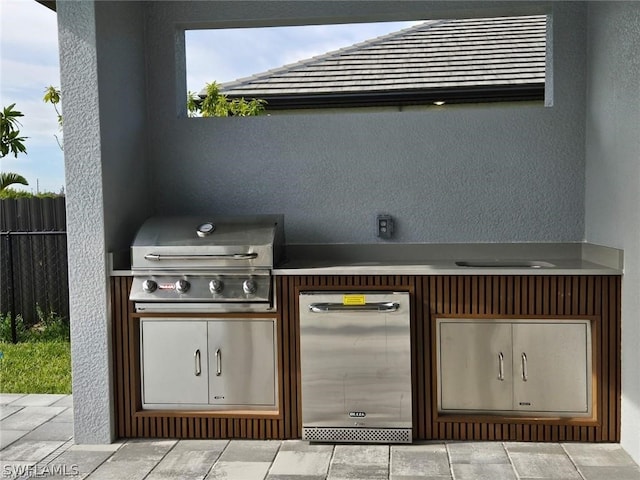 view of patio / terrace with a grill and area for grilling