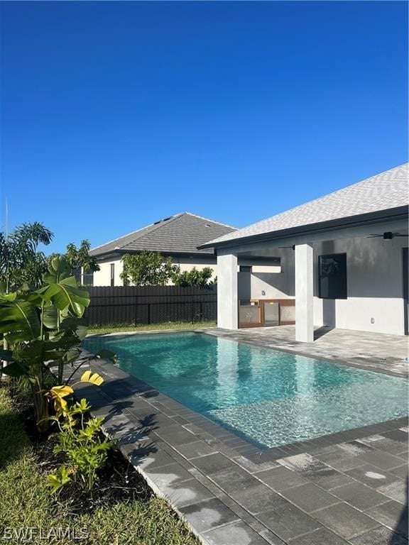 view of swimming pool featuring a patio area