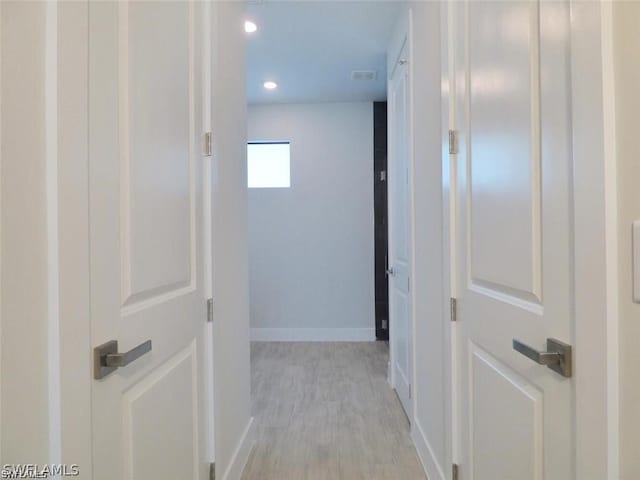 hall featuring light hardwood / wood-style flooring