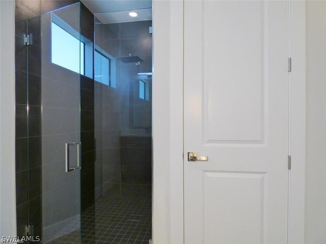 bathroom featuring walk in shower