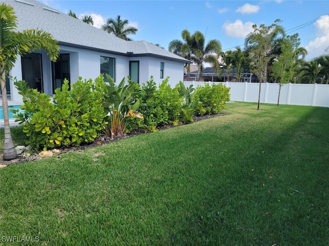 view of yard featuring fence