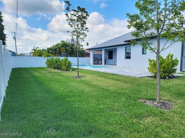 view of yard featuring a fenced backyard and a patio