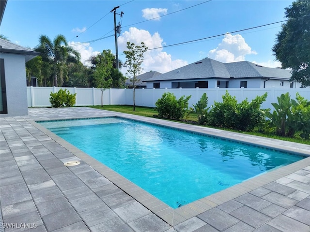 view of swimming pool with a fenced backyard and a fenced in pool