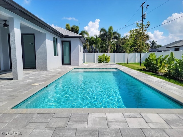 view of pool with a fenced in pool, a patio area, and a fenced backyard