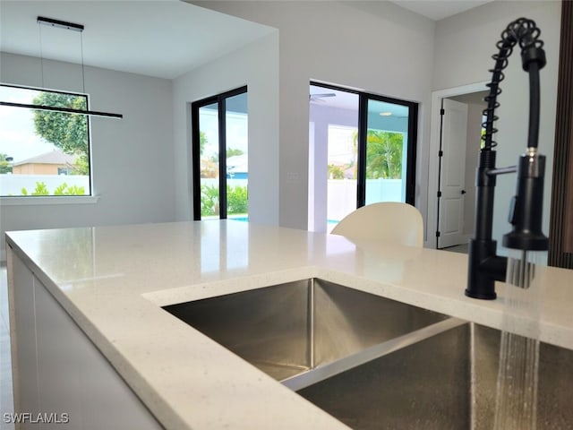 kitchen featuring light stone counters