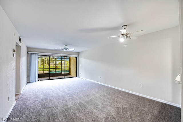 unfurnished room with carpet flooring and ceiling fan