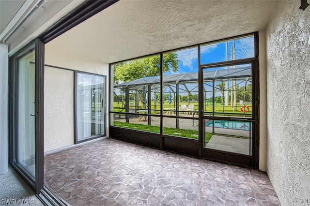 unfurnished sunroom with a healthy amount of sunlight