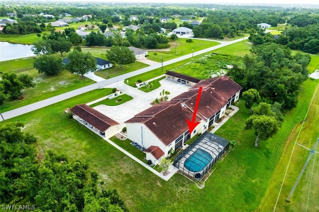 birds eye view of property featuring a water view