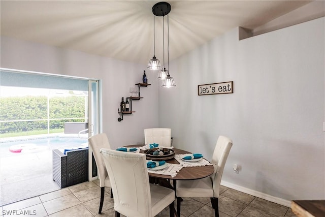 dining area with tile patterned floors