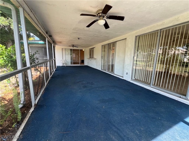 view of patio featuring a balcony