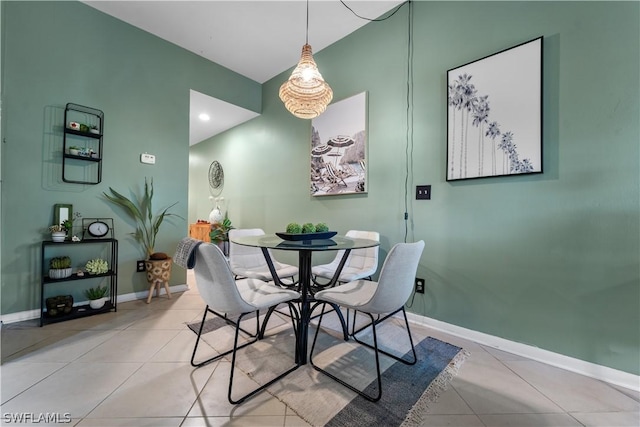 dining space with light tile patterned floors