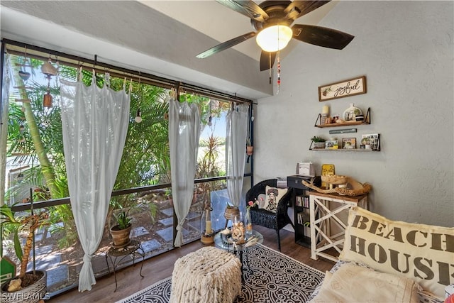 interior space featuring ceiling fan