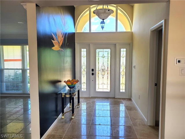 entrance foyer featuring a high ceiling