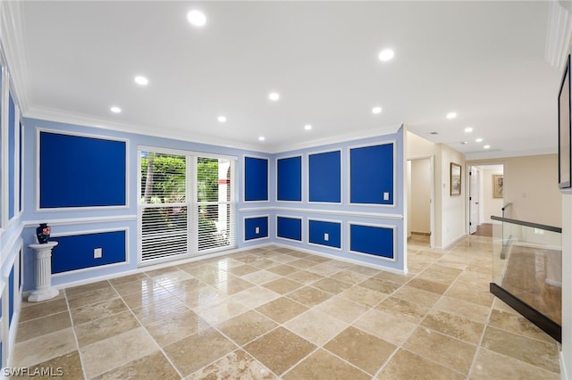 unfurnished living room featuring crown molding