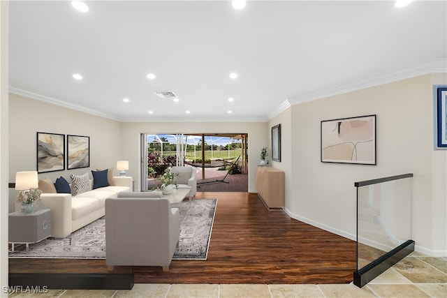 living room featuring wood-type flooring and ornamental molding