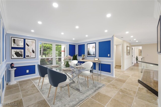 dining space with crown molding