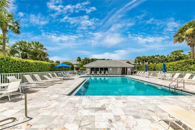 view of pool featuring a patio area