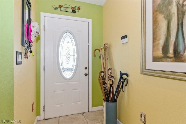 foyer with light tile patterned flooring