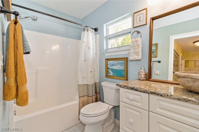 full bathroom featuring shower / bathtub combination with curtain, vanity, and toilet