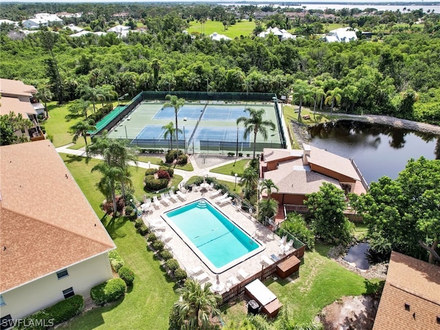 birds eye view of property featuring a water view