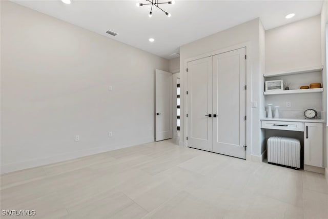 interior space with a chandelier