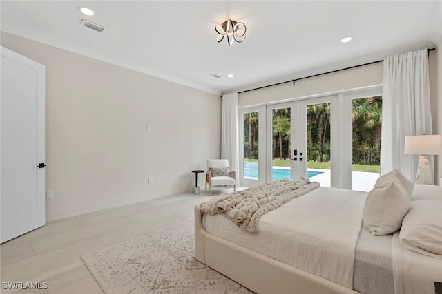 bedroom with access to exterior and french doors