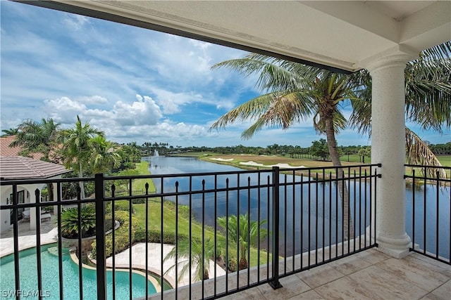 balcony featuring a water view