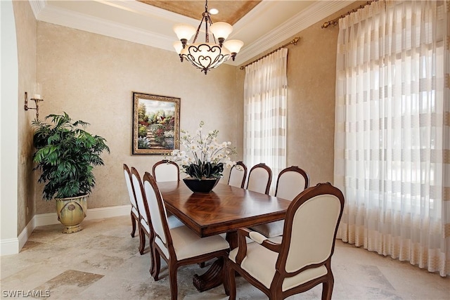 dining area featuring an inviting chandelier