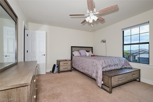 bedroom featuring carpet and ceiling fan