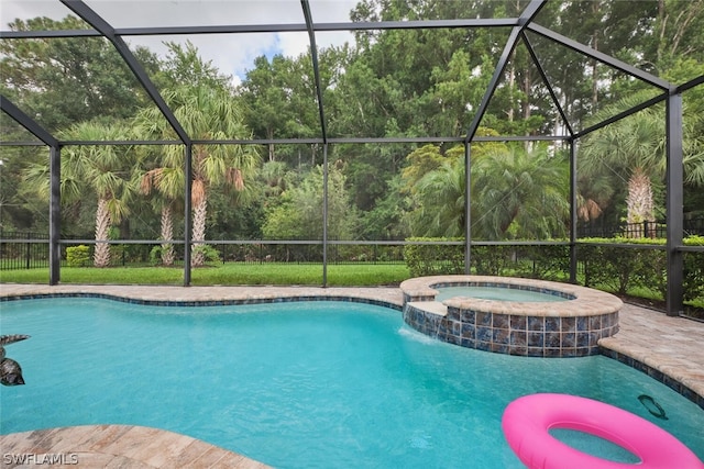 view of swimming pool with glass enclosure and an in ground hot tub