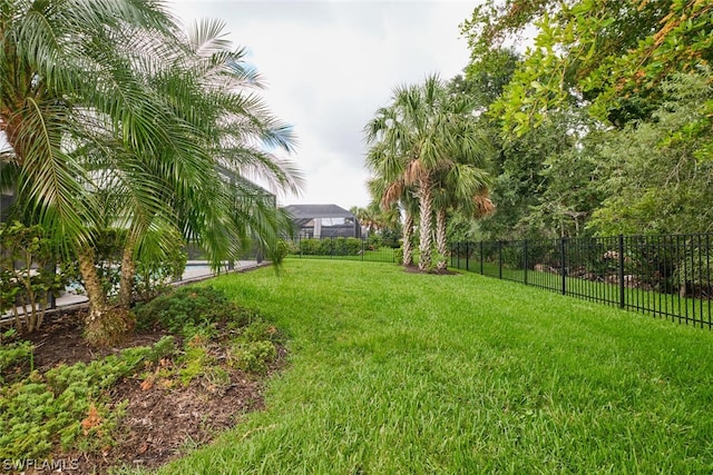 view of yard with fence