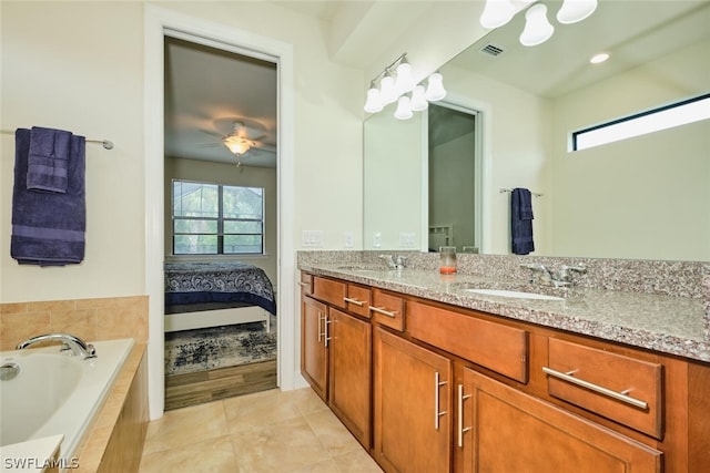 bathroom with tile patterned flooring, vanity, ceiling fan, and plenty of natural light