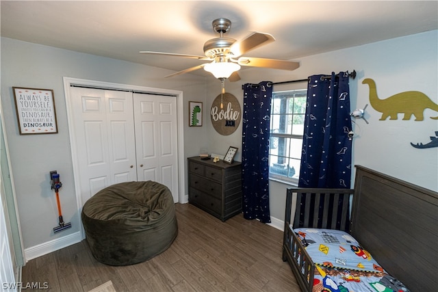 bedroom with wood-type flooring, a closet, and ceiling fan