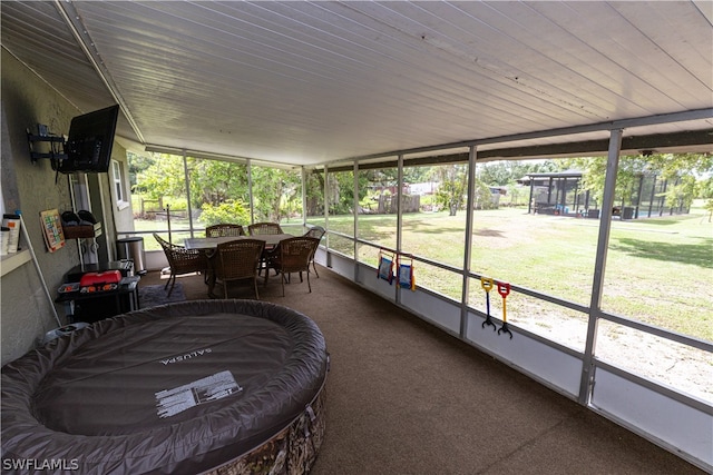 sunroom / solarium with a healthy amount of sunlight