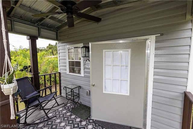 exterior space with plenty of natural light and ceiling fan