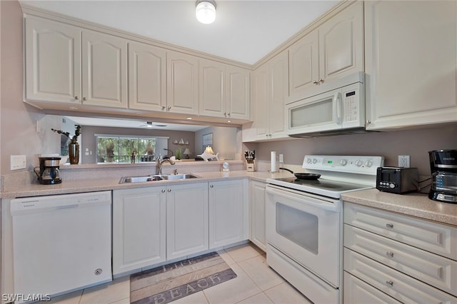 kitchen with light tile patterned floors, white appliances, ceiling fan, and sink