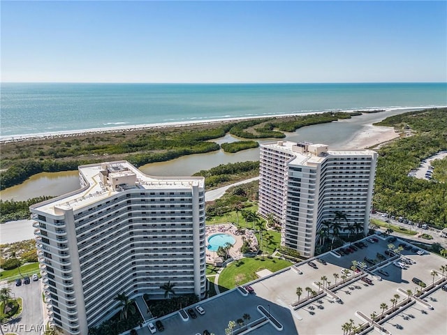 bird's eye view with a view of the beach and a water view